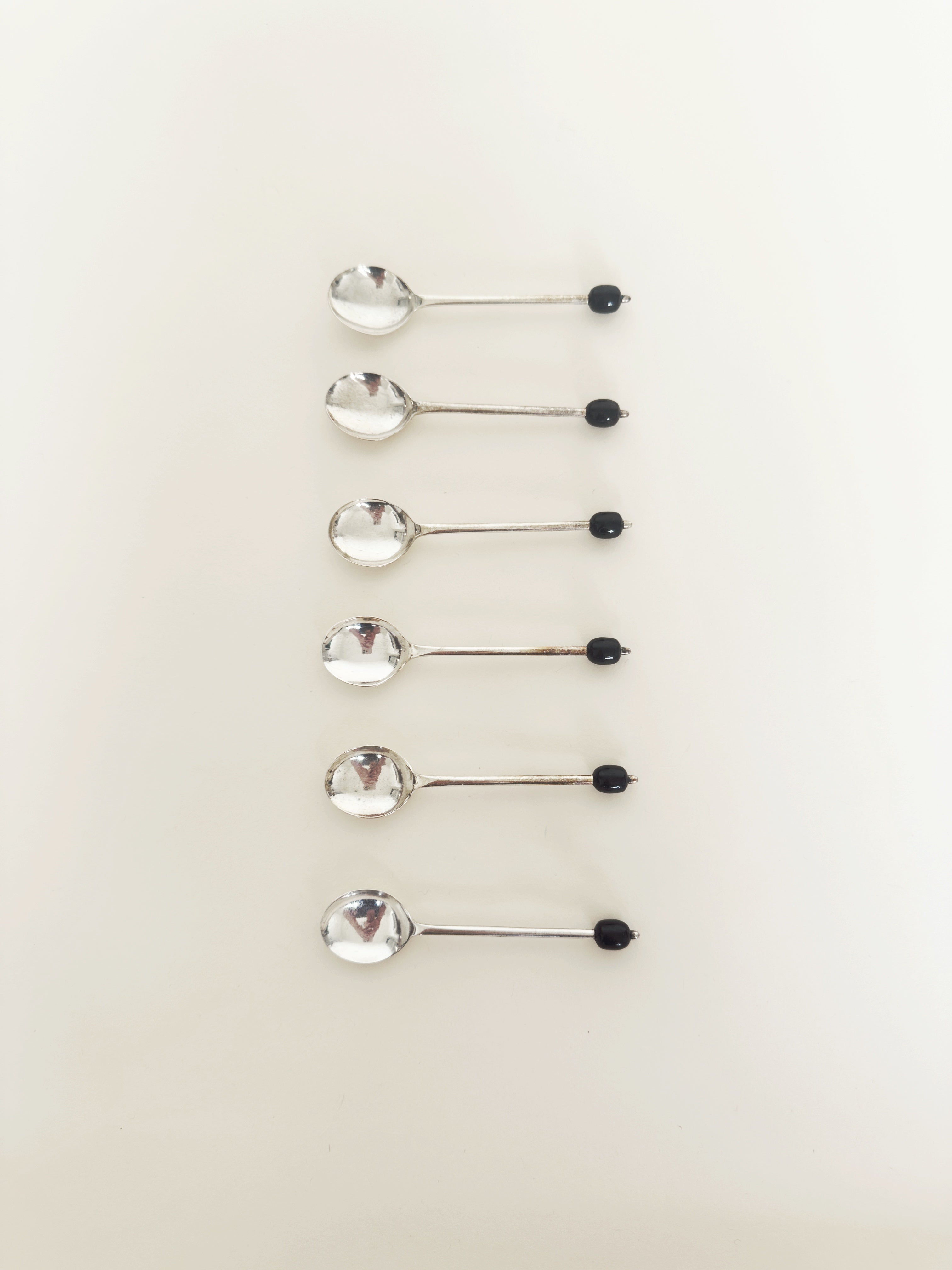 Set of six silver plate coffee bean spoons